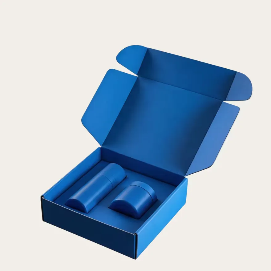 An open blue printed box holding two blue bottles in a fitted insert.