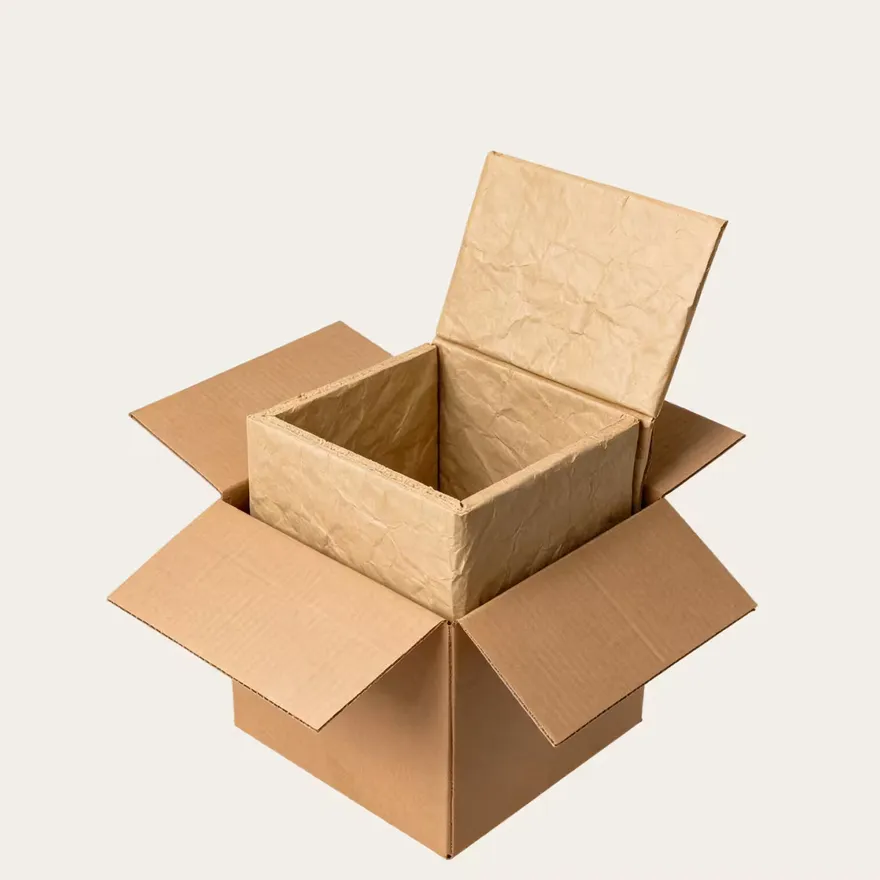 A corrugated box opened to show its moulded kraft paper liner.