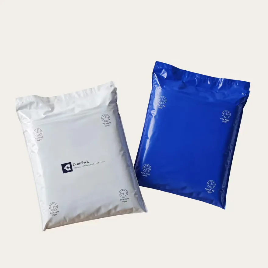Two padded mailers, one white and one blue, marked with puncture points.